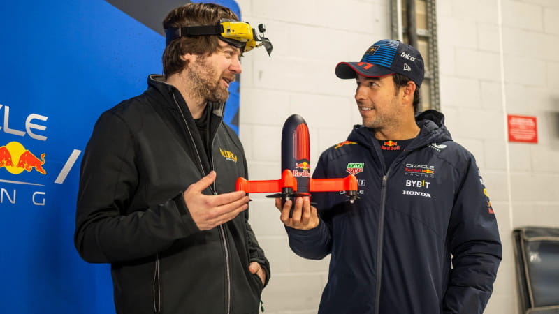 Pilot Ralph Hogenbrik with Red Bull F1 driver Sergio Perez