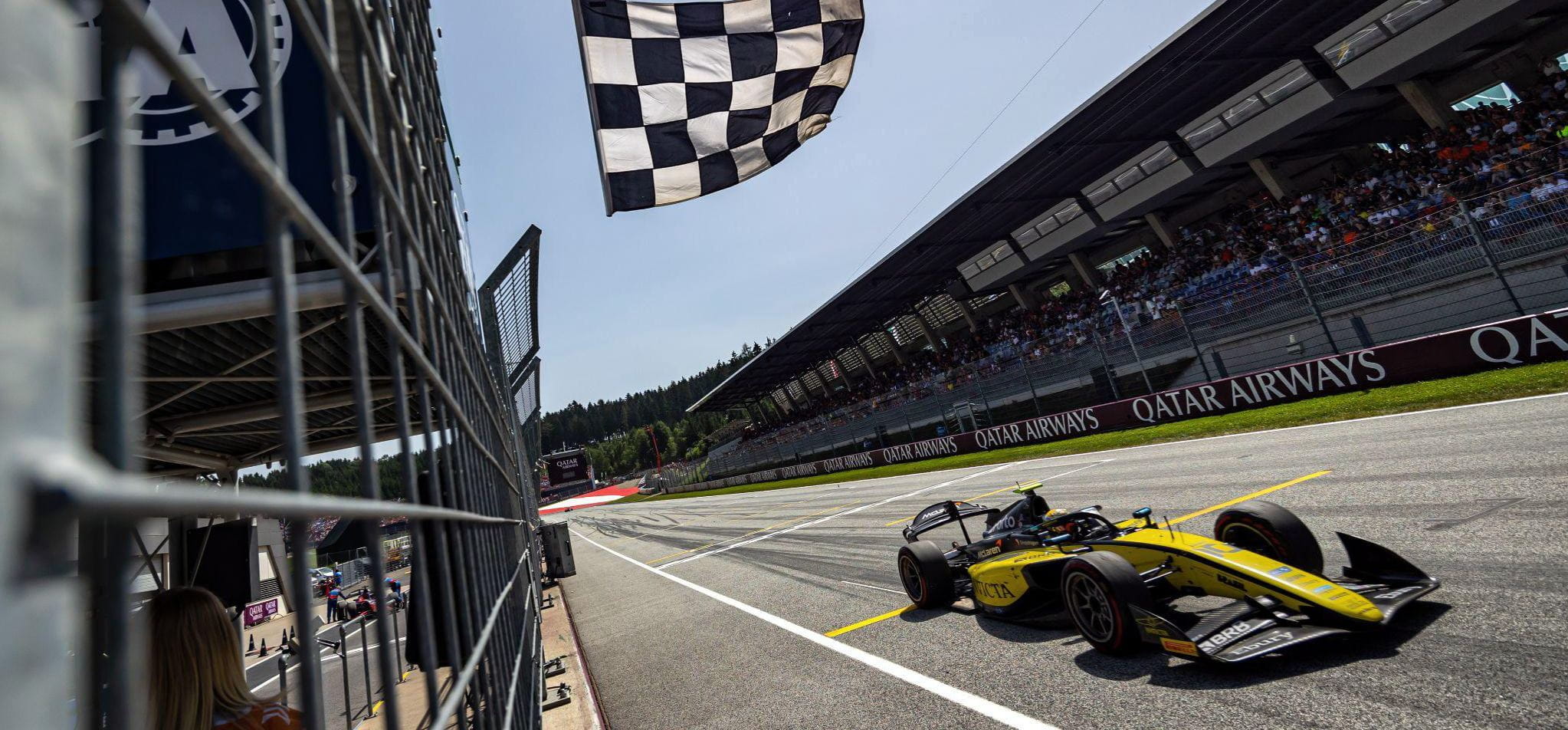 Photograph: Invicta Racing’s Gabriele Bortoleto takes the chequered flag to win the Austrian F2 feature race