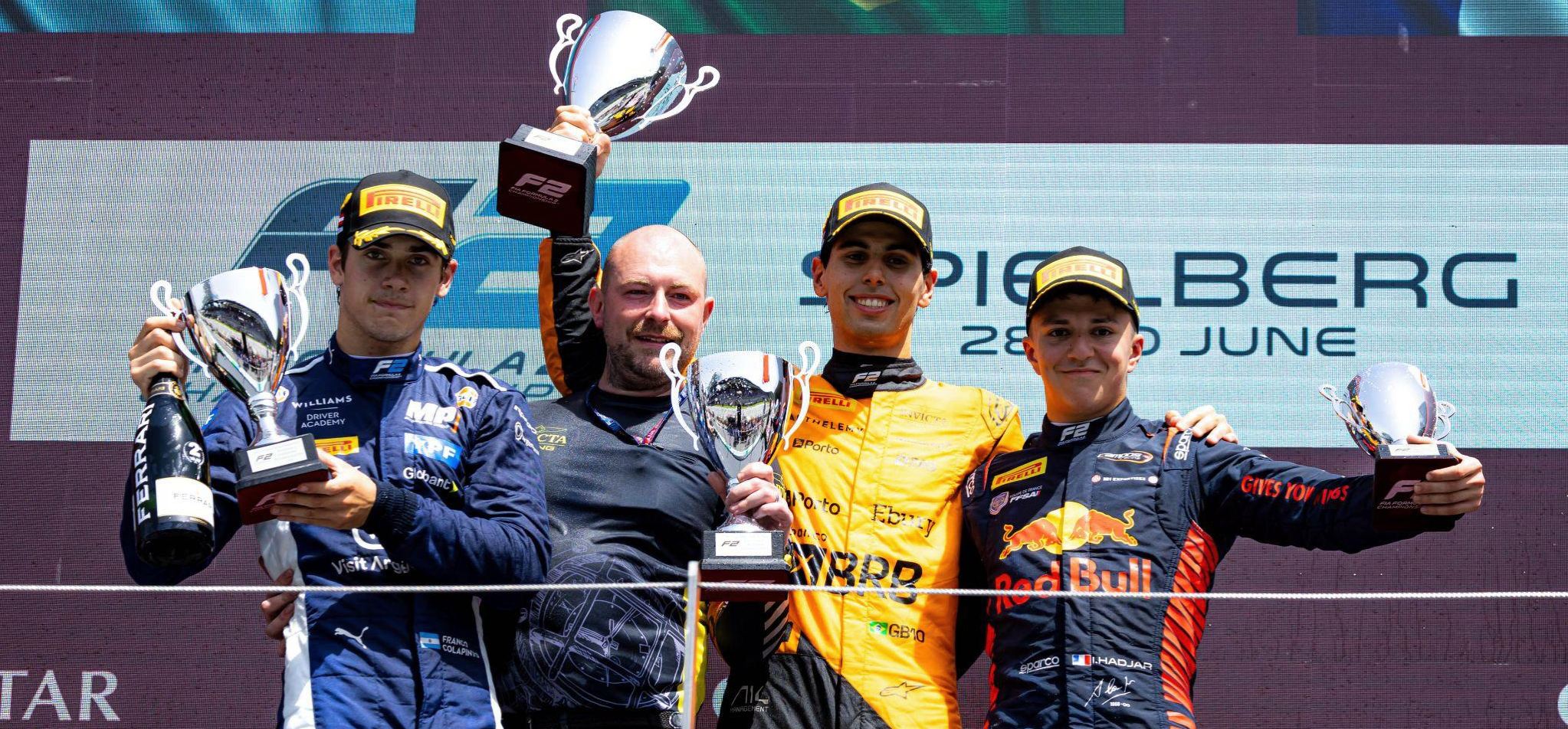 Photograph: Second-placed driver Franco Colapinto (L), feature race winner Gabriele Bortoleto (centre) and third-place finisher Isack Hadjar (R) on the podium in Austria