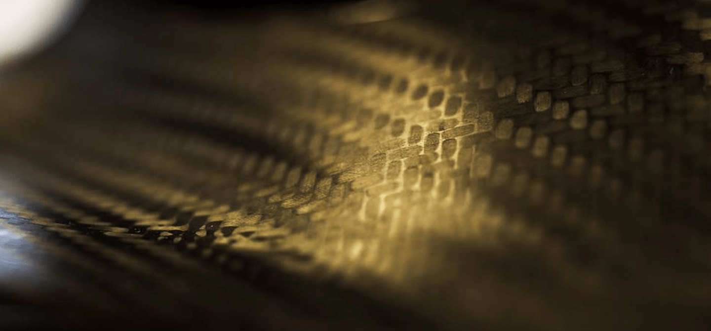 A close-up look at carbon-fibre, showing a ‘weave’ pattern following a certain calculated direction for rigidity