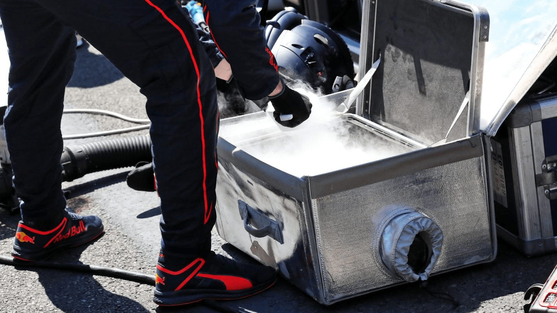 Dry ice being collected to cool an engine before a Formula 1 race
