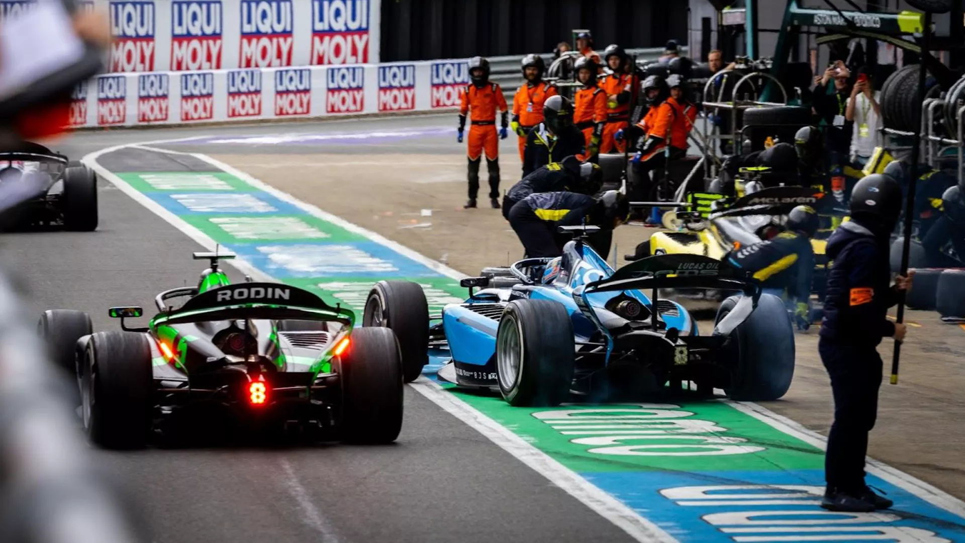The fast lane of the pitlane (left) was resurfaced in June along with numerous parts of the track itself