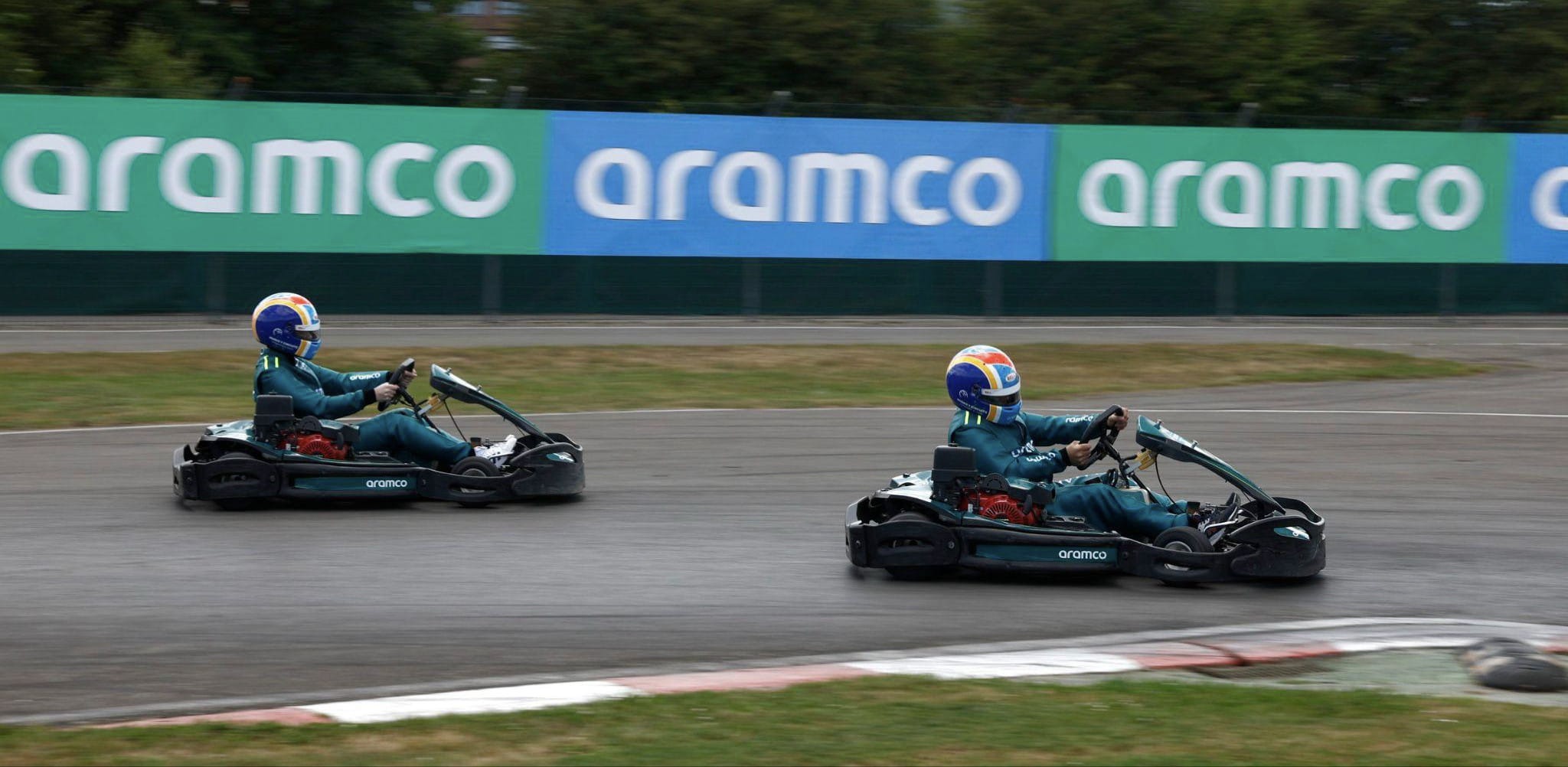 Karting event with Aramco signage in background