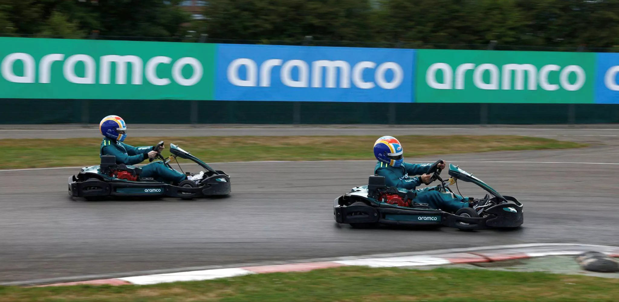 Karting event with Aramco signage in background