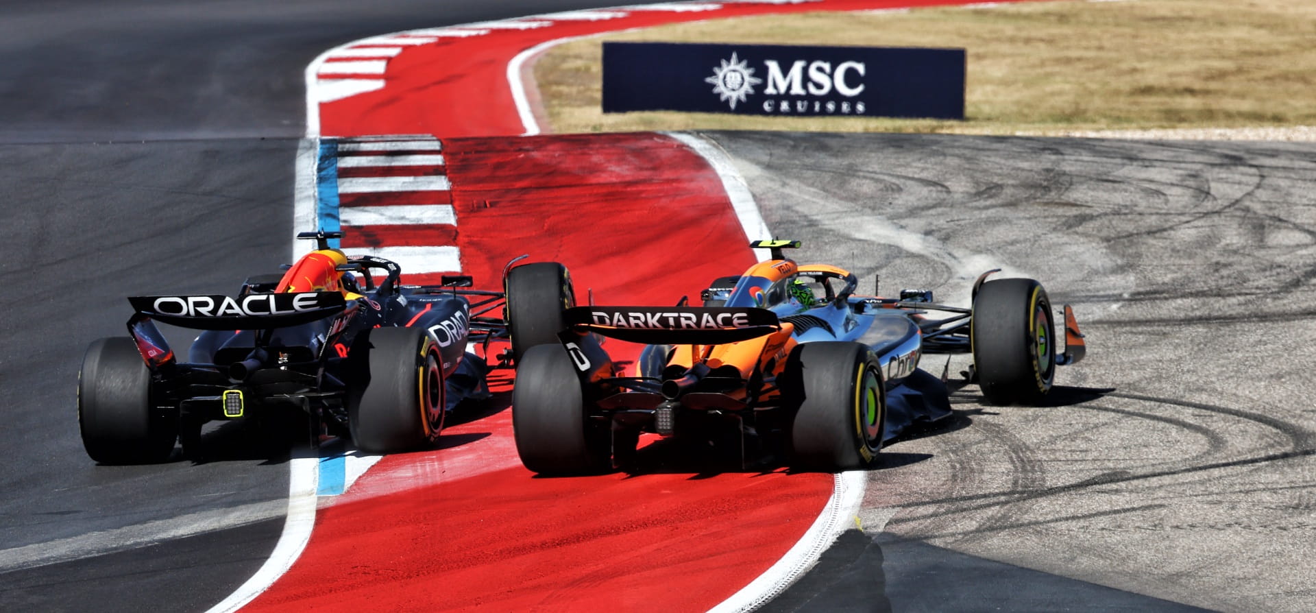 Two cars going wheel to wheel at the 2024 United States Grand Prix