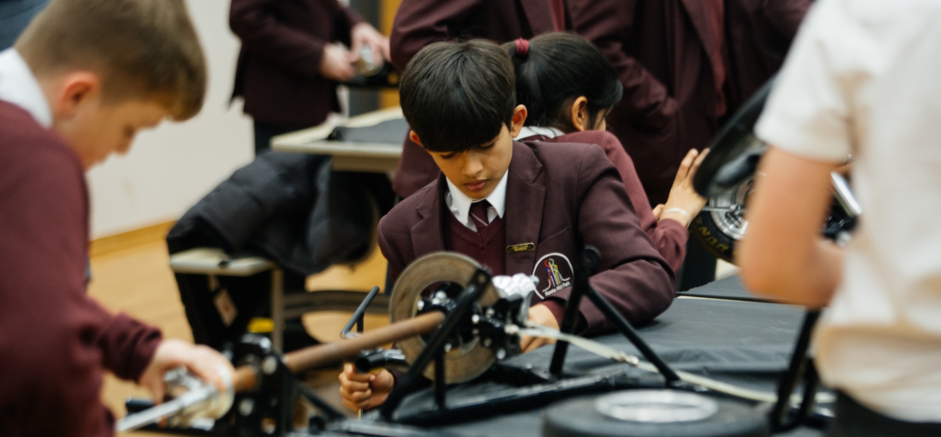 Students working on STEM on Track kart