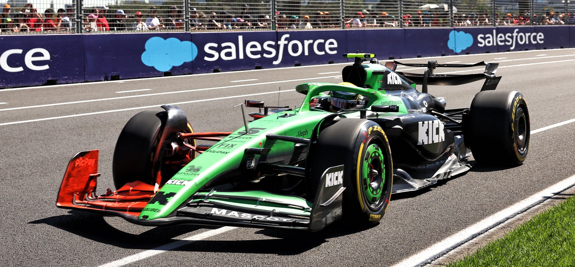 Green Sauber F1 2025 car with red flow-vis paint on the right of its front wing