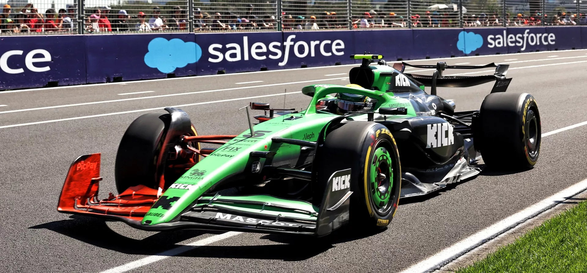 Green Sauber F1 2025 car with red flow-vis paint on the right of its front wing