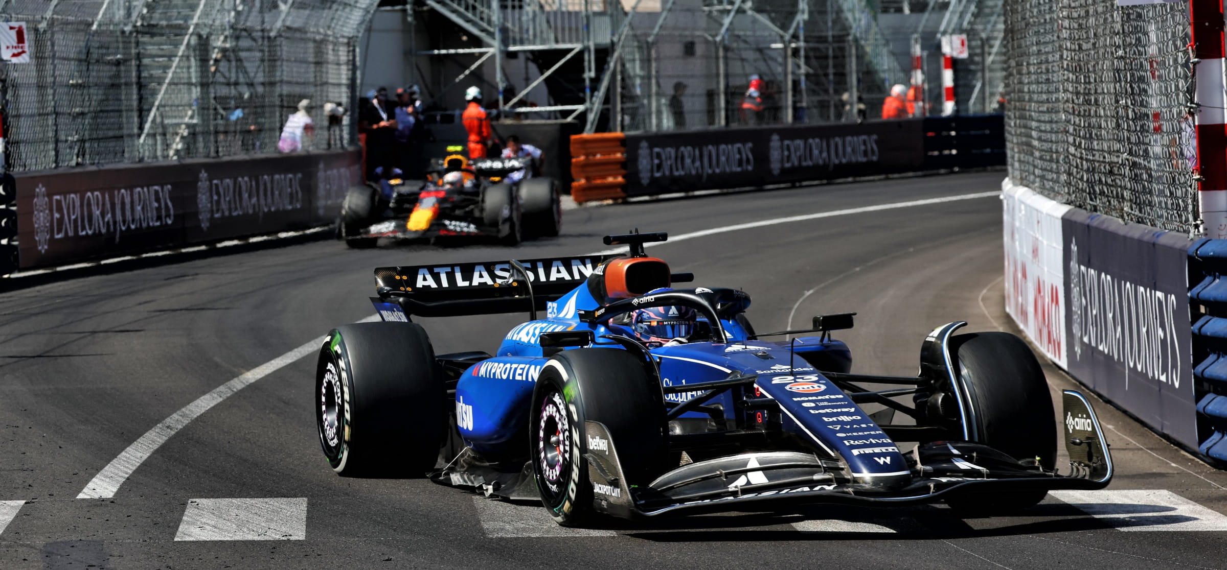 Williams driver Alex Albon scored two points in ninth place at Monaco after shrugging off a tangle with Mercedes's George Russell