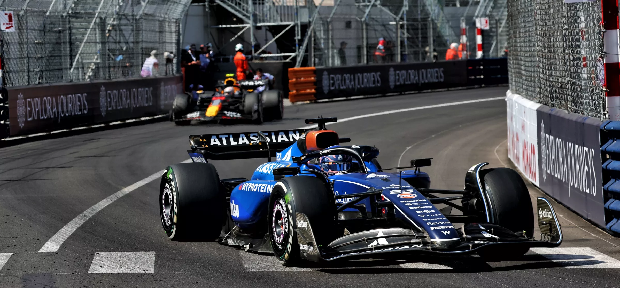 Williams driver Alex Albon scored two points in ninth place at Monaco after shrugging off a tangle with Mercedes's George Russell