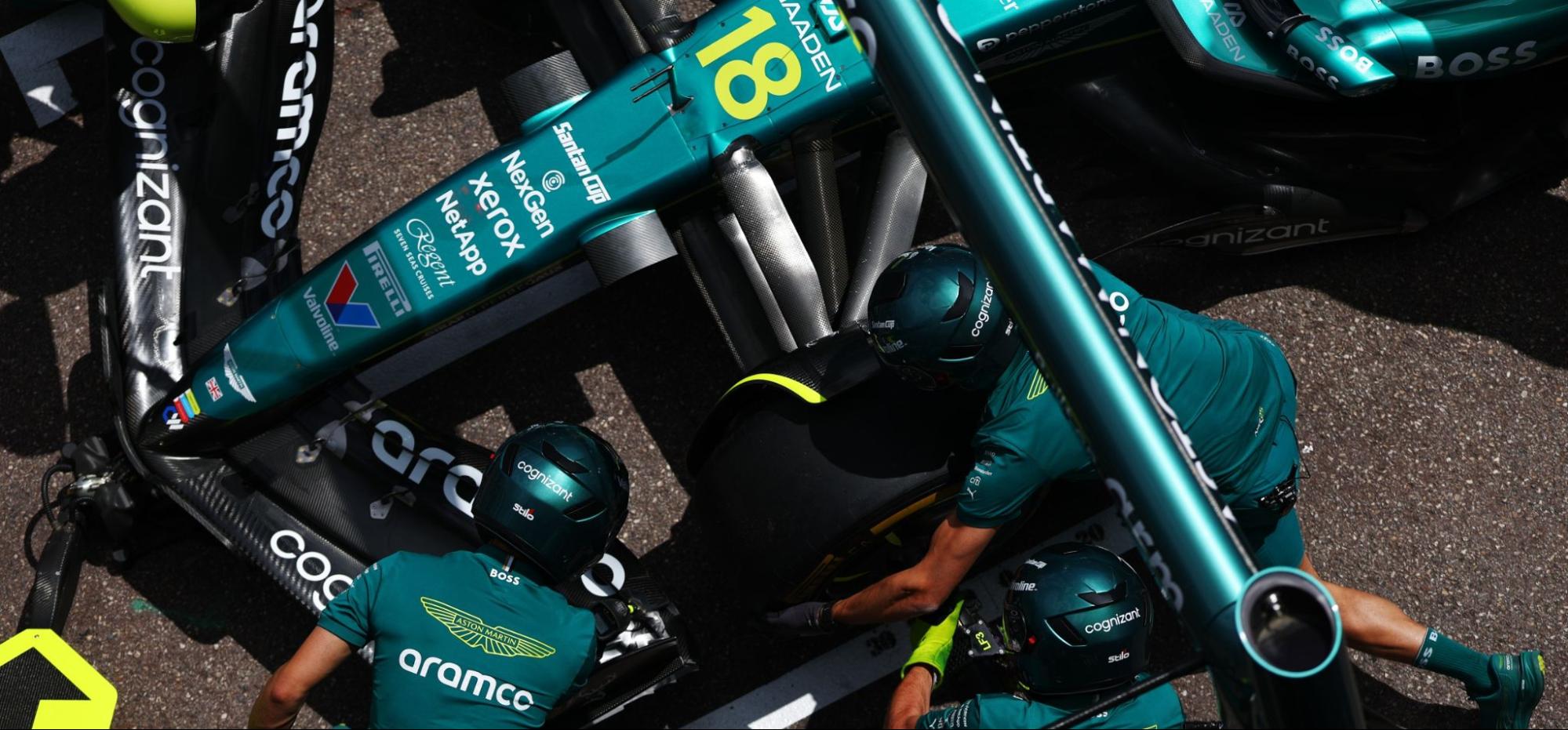 Aston Martin F1 car from above with pit crew