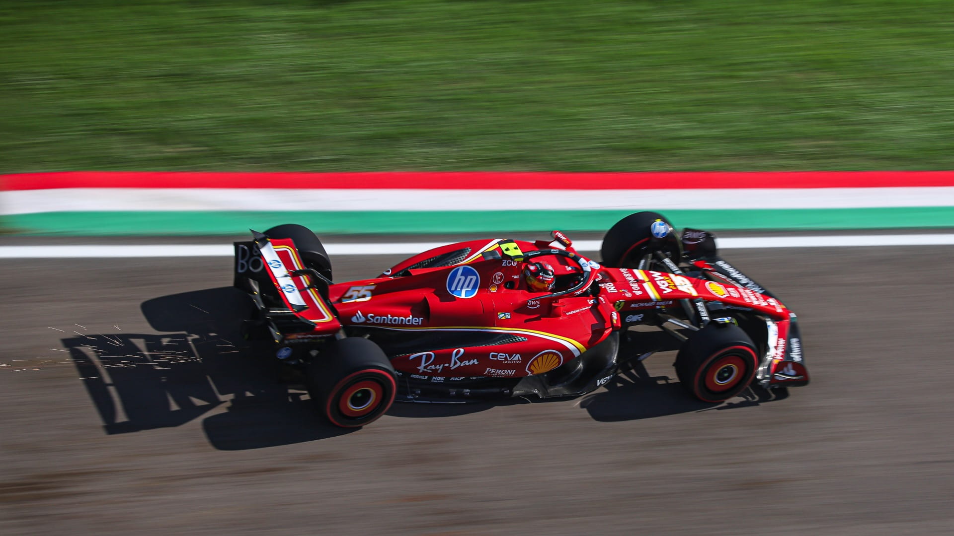 Ferrari at Imola F1 track with Italian flag kerbs
