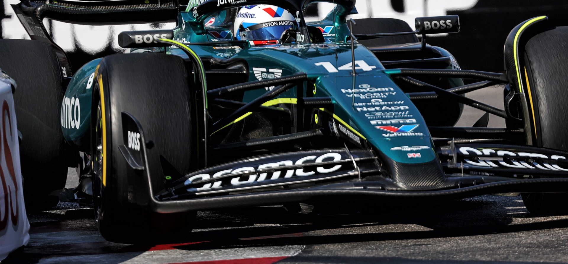 Aston Martin F1 car going over kerbs