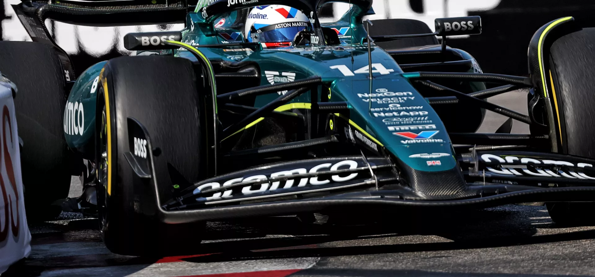 Aston Martin F1 car going over kerbs