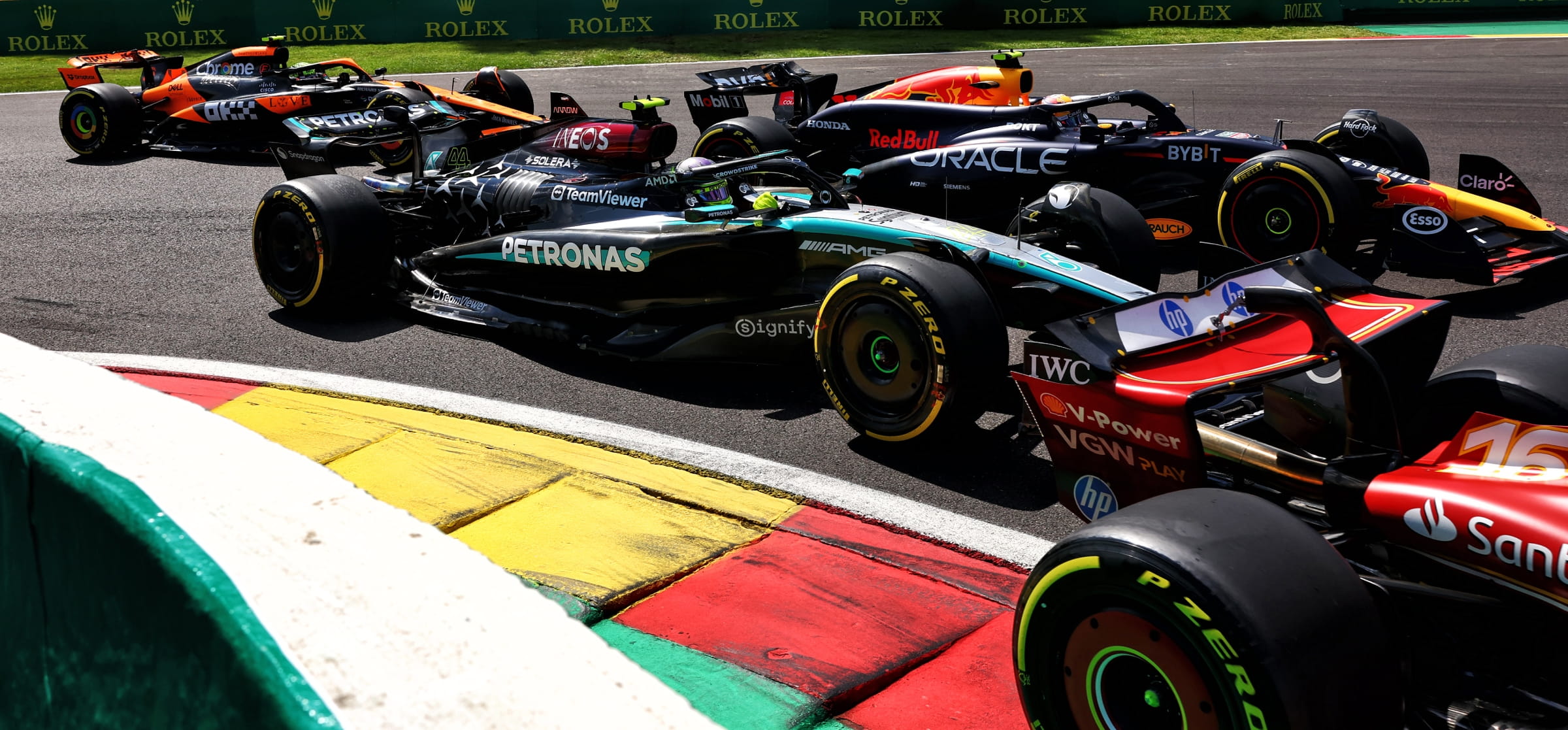 Cars at La Source at the start of the 2024 Belgian Grand Prix