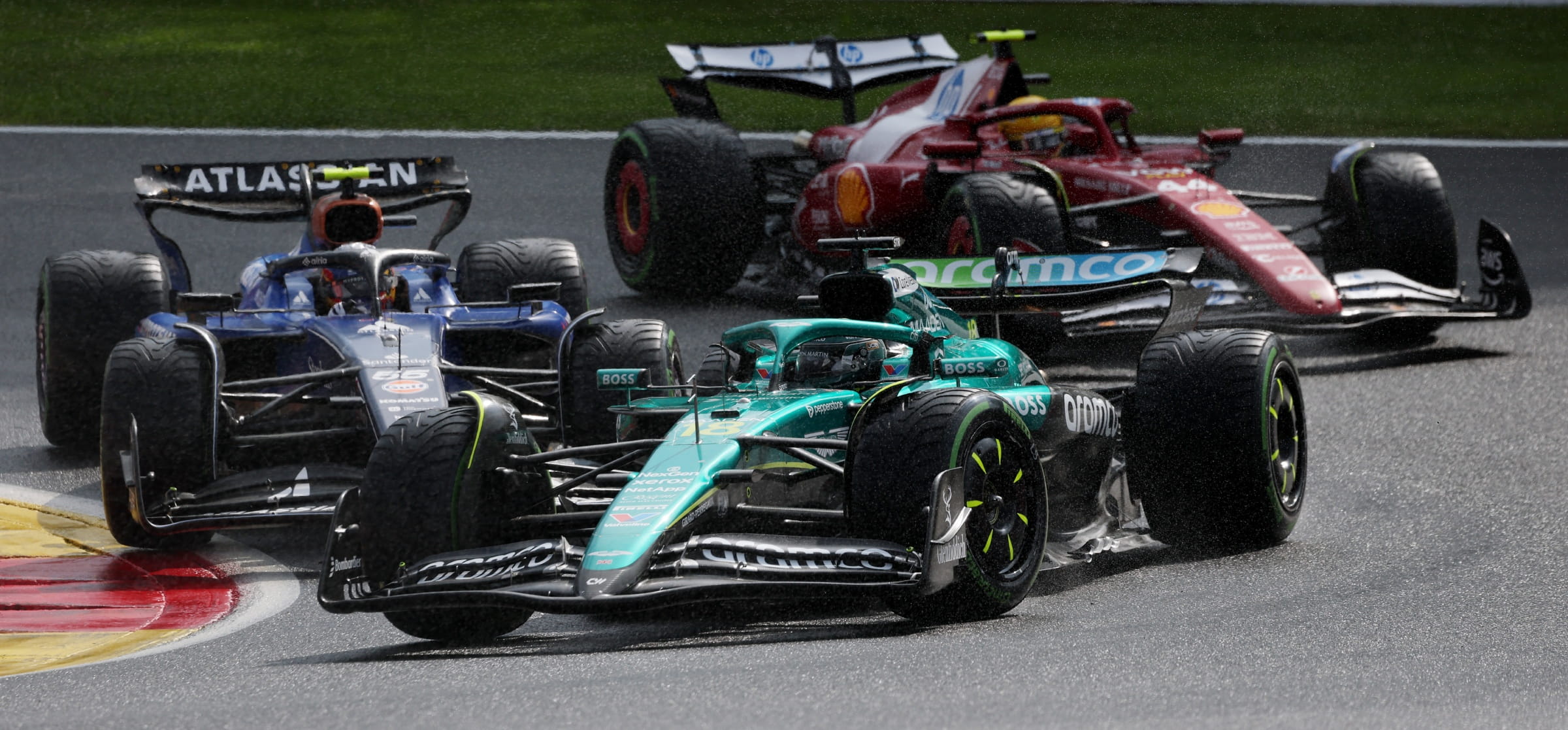Aston Martin, Williams and Ferrari F1 cars 
