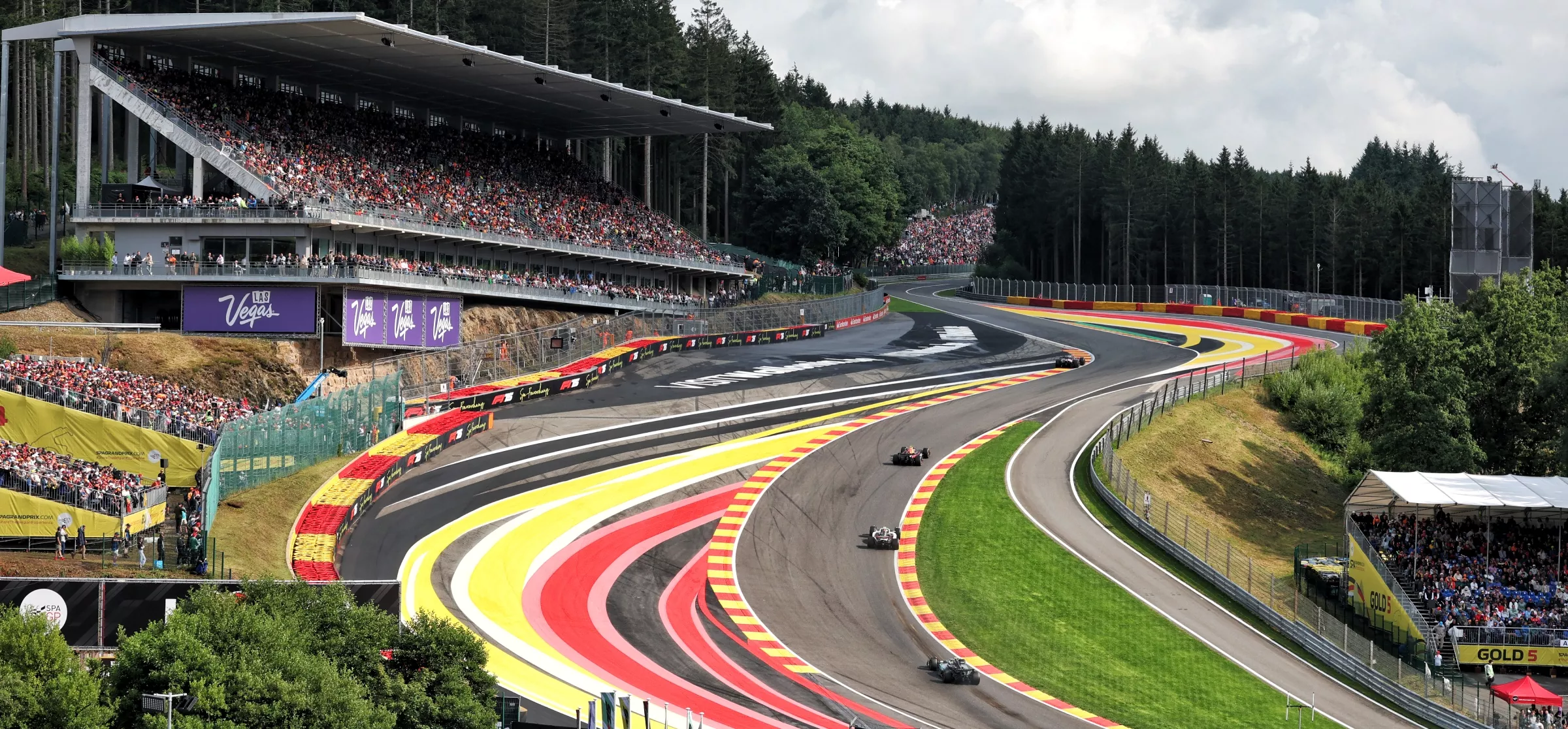 Cars climbing Eau Rouge in Belgium