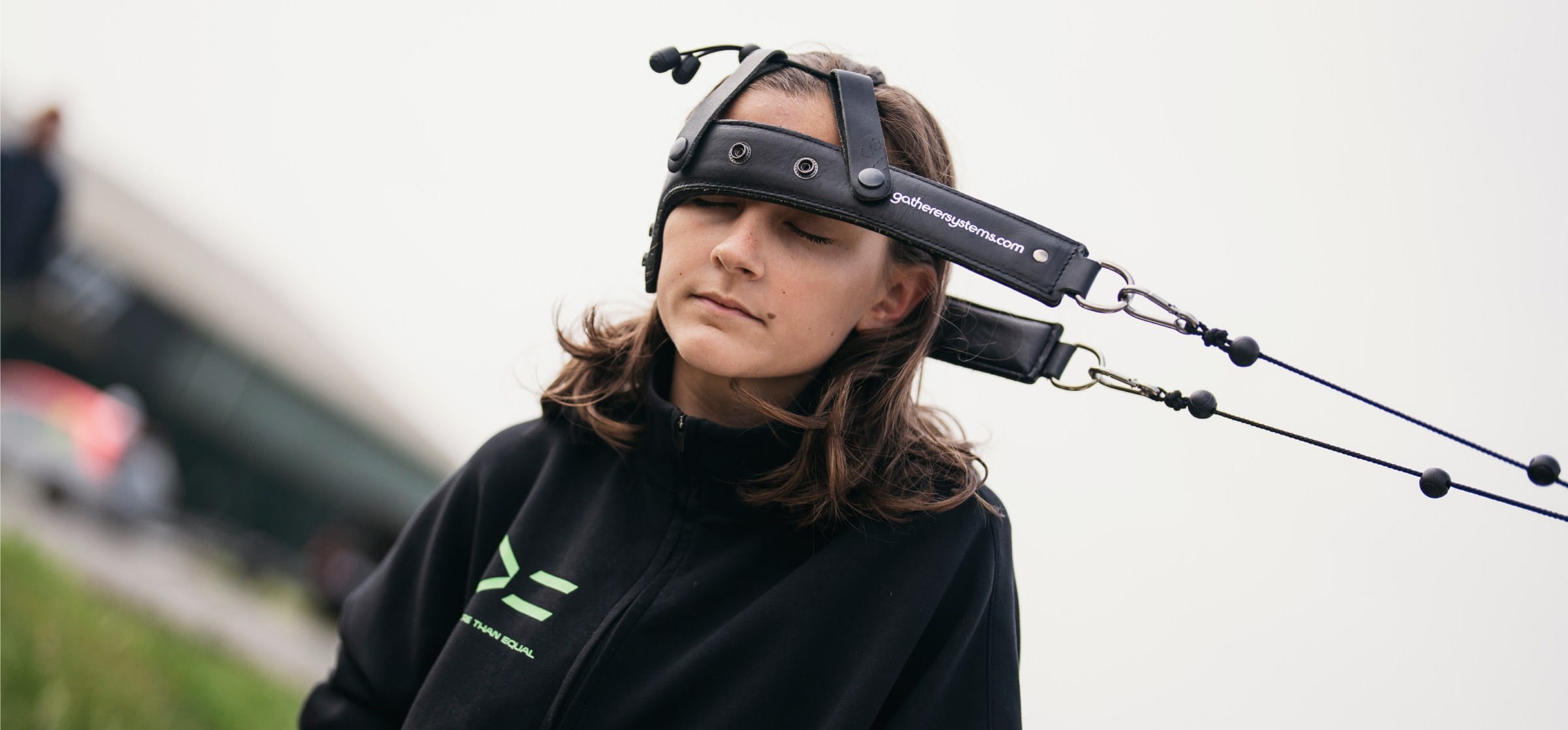 Female racing driver training neck