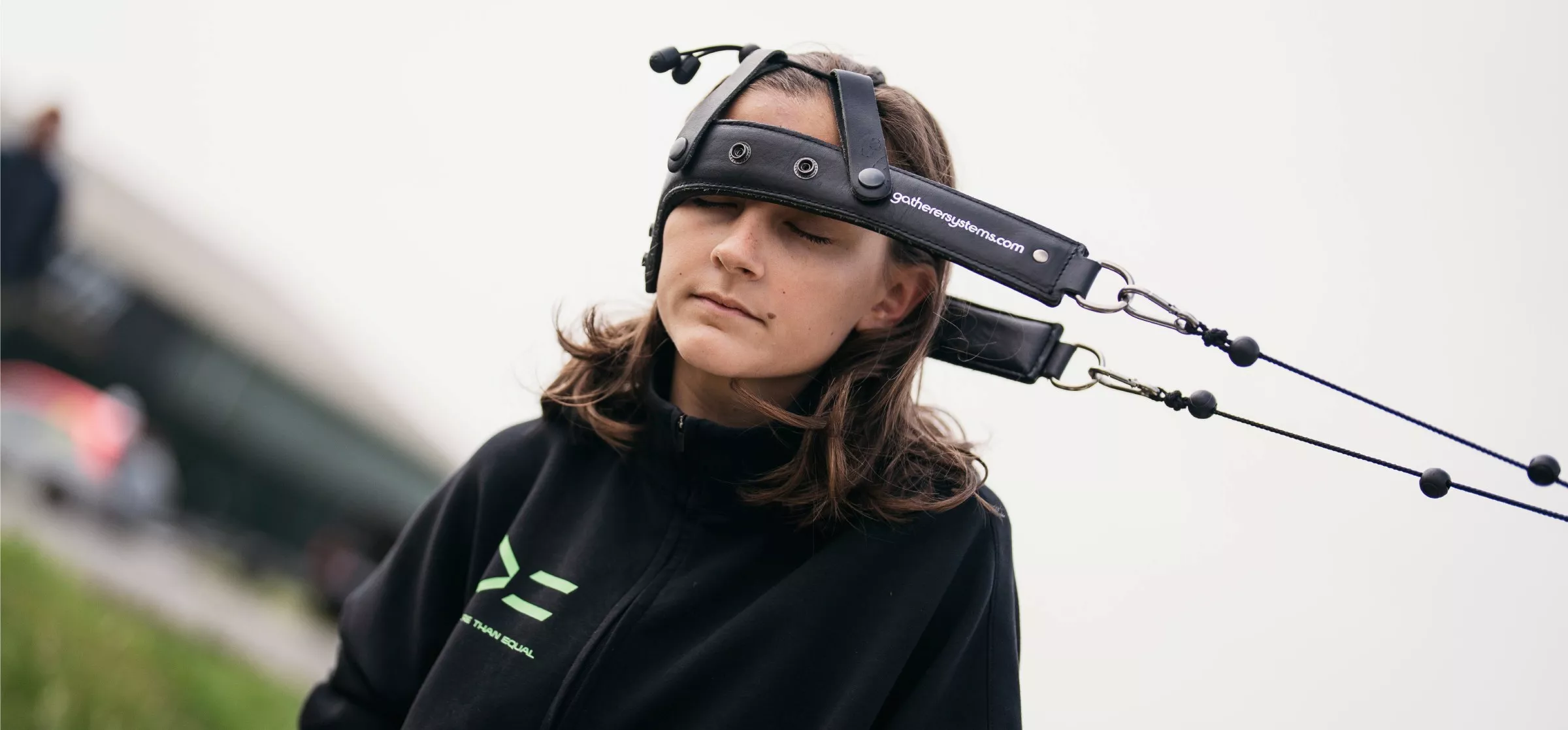 Female racing driver training neck