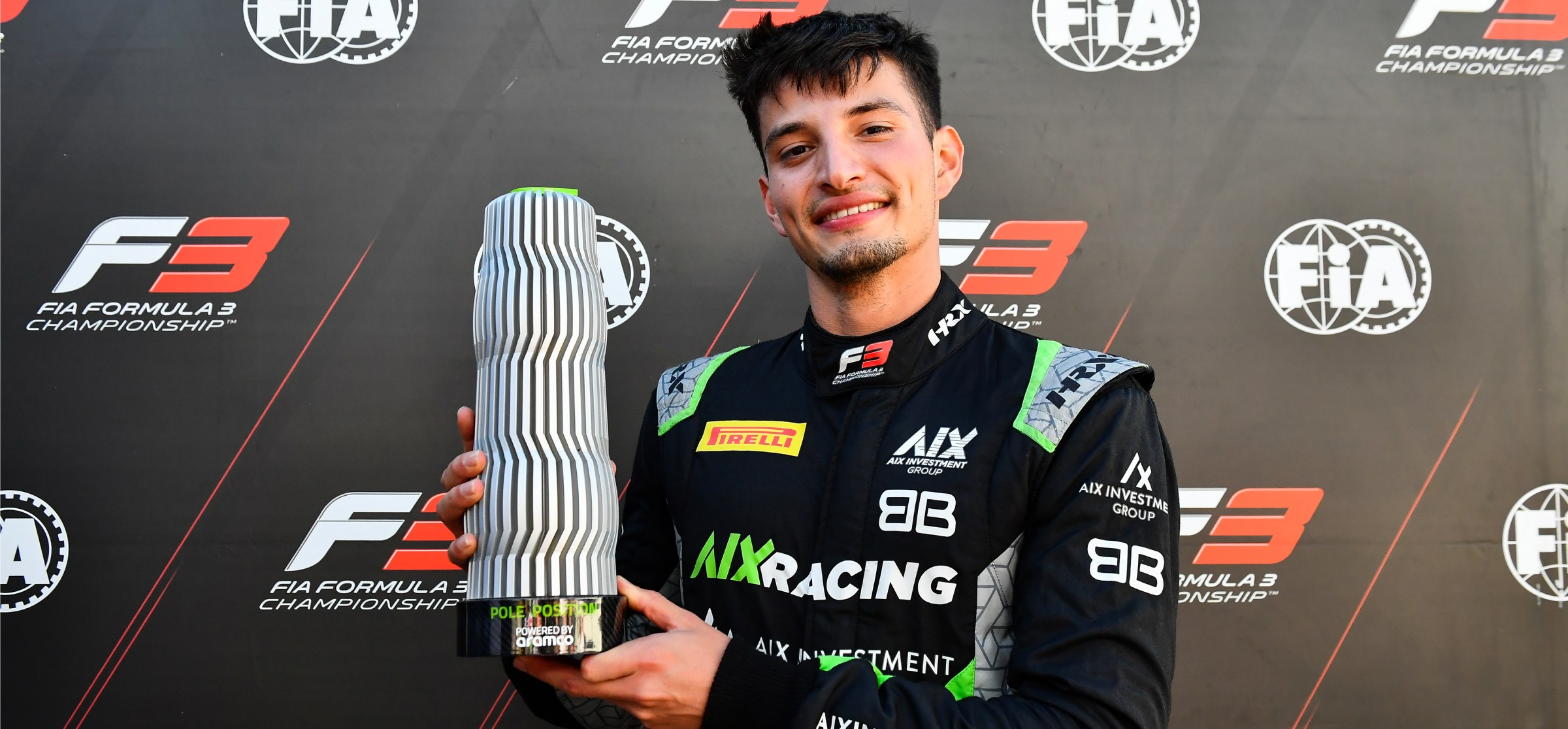 Brad Benavides holding Aramco Pole Position Award in 2025