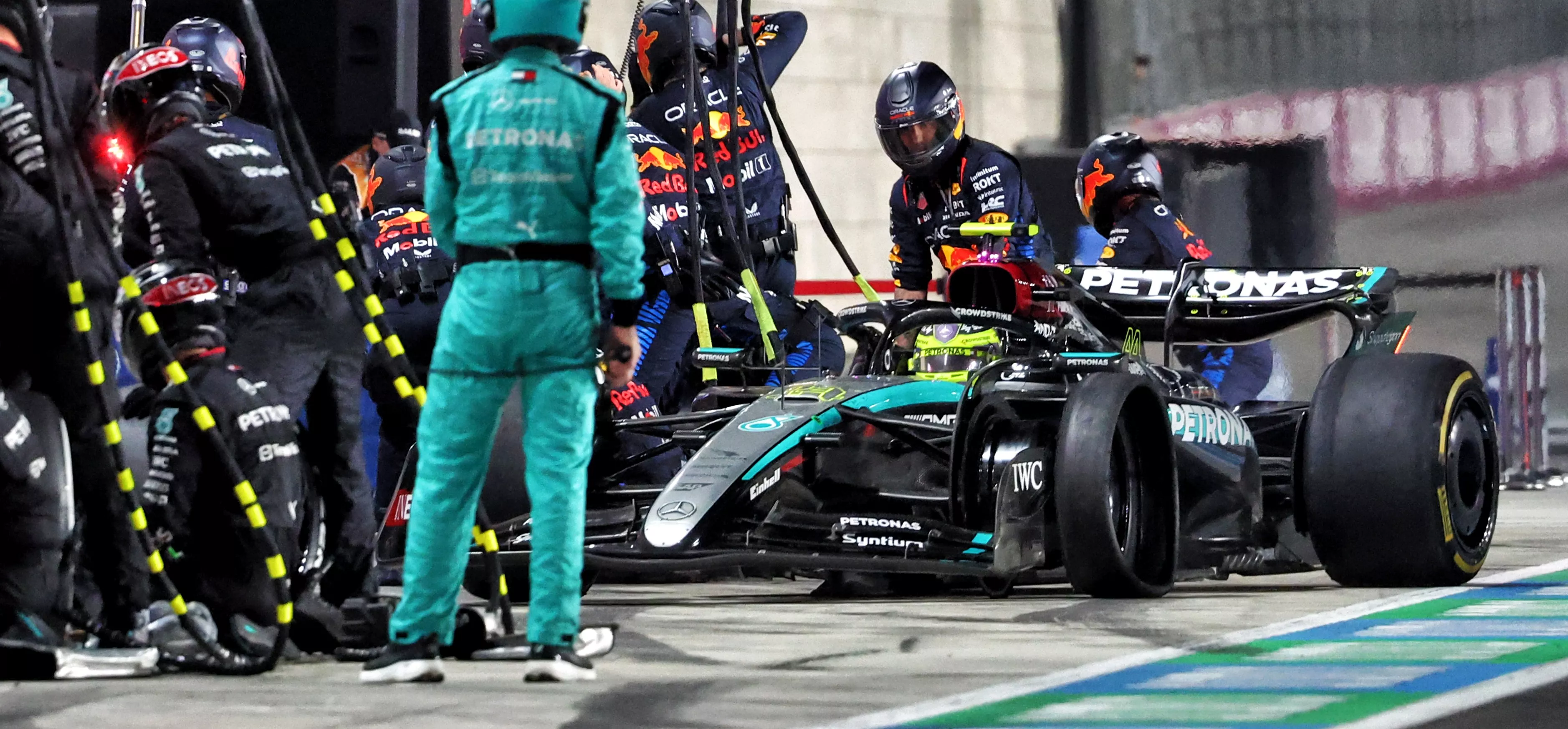 Mercedes F1 car entering pitbox in 2025