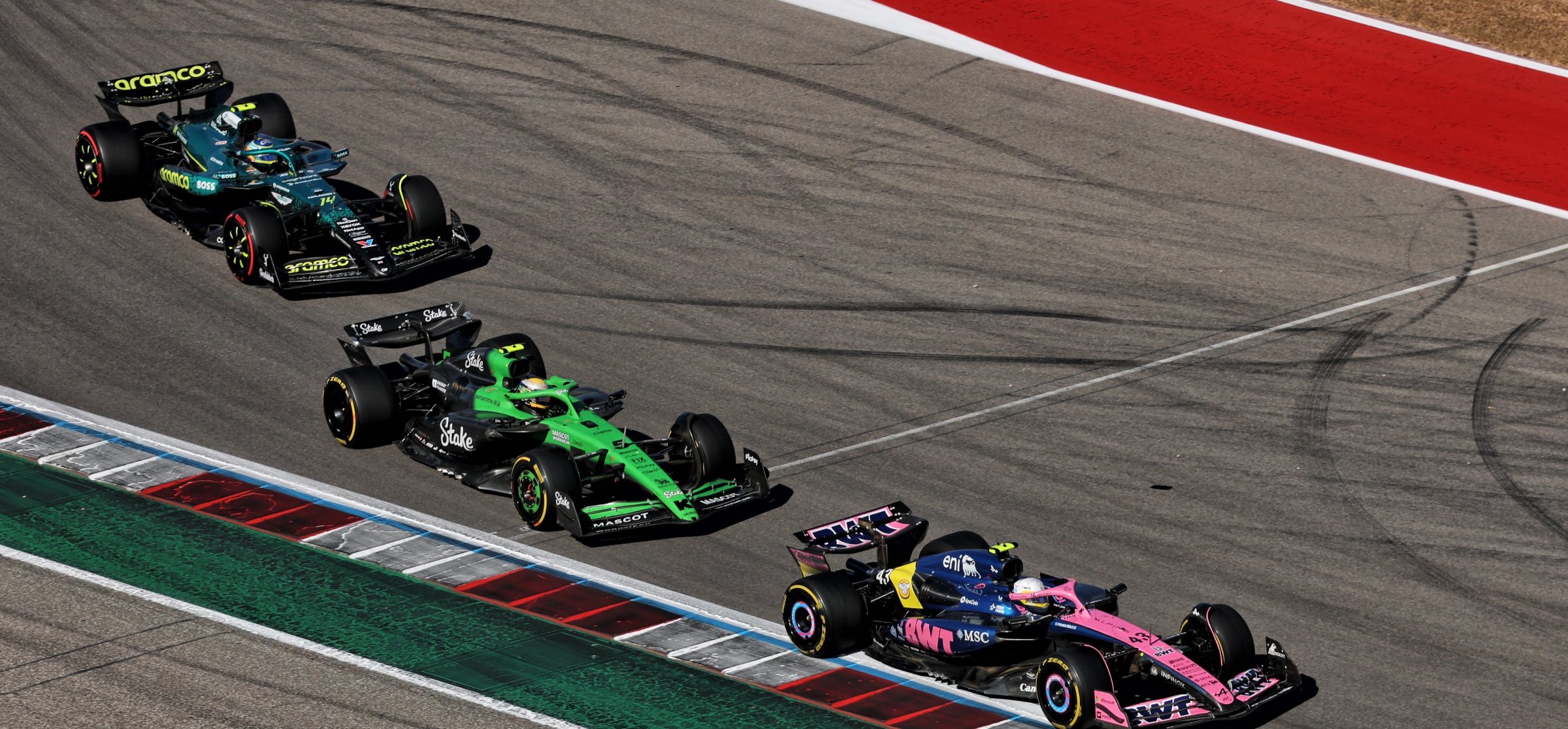three F1 cars at COTA 2025