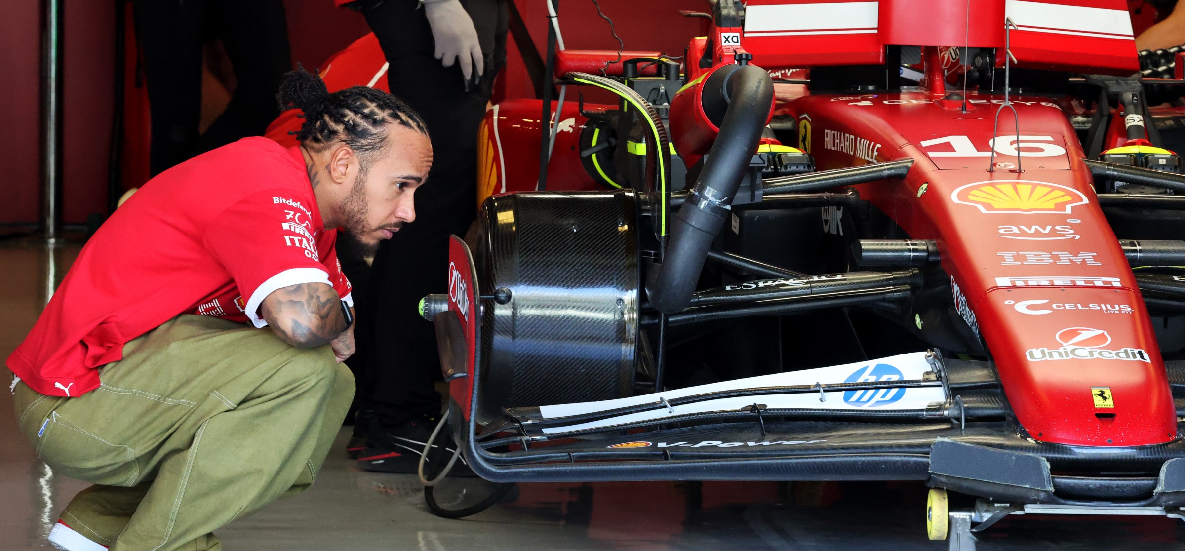 Lewis Hamilton looking at Ferrari