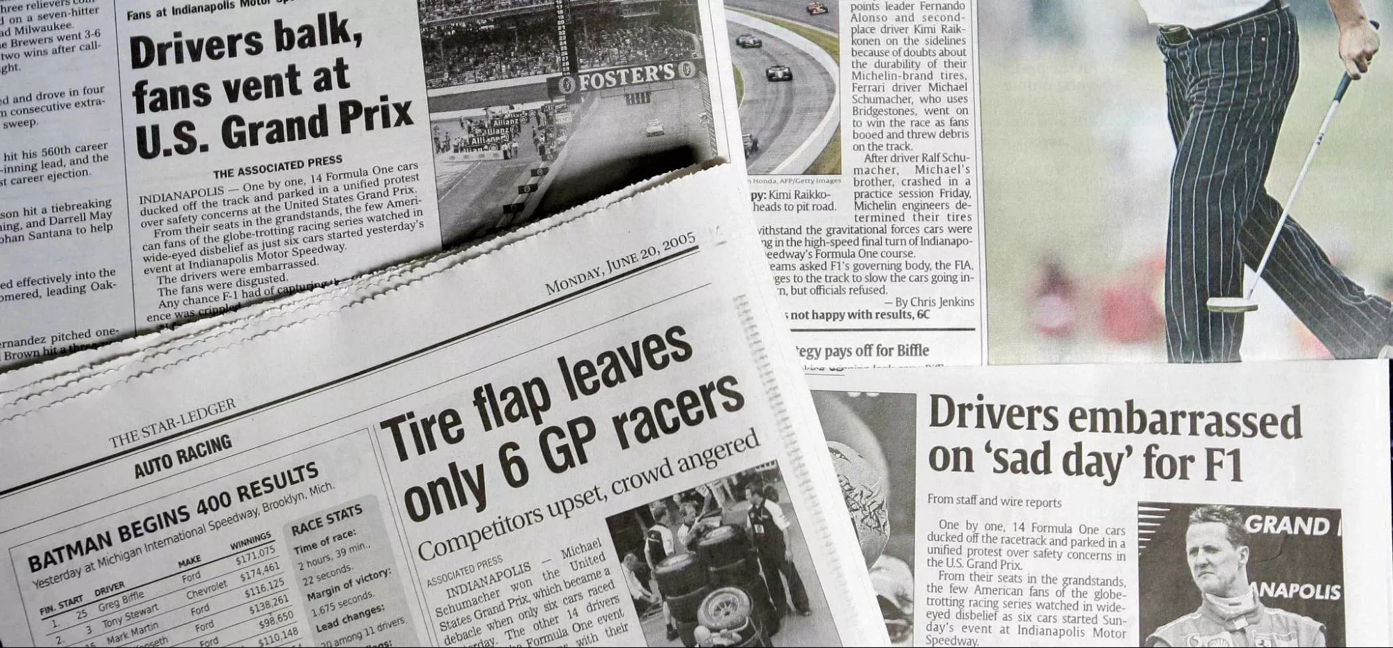 Newspapers showing headlines about 2005 US GP
